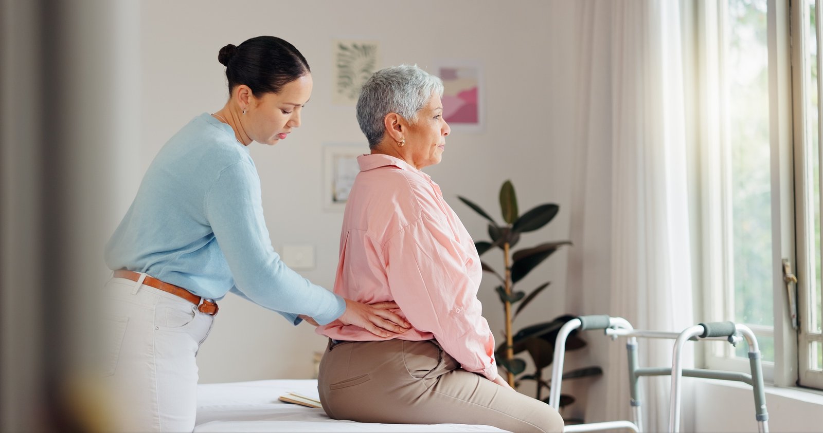 Back pain, physiotherapy and mature woman for medical service, consulting and wellness. Healthcare,